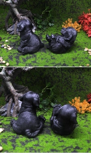 Vista detallada de la textura de pelo realista de figuras de perros de resina negra jardín