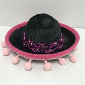 Mini black felt Mexican party hat with pink pom poms and purple woven trim details