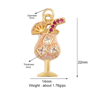 Colorful cocktail glass charm in gold alloy with pink glitter and sparkling gemstones
