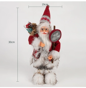 Front view of a 30cm Santa Claus doll holding a Merry Christmas sign with size dimensions