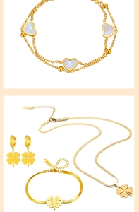 Detailed close-up of gold-plated stainless steel four-leaf clover jewelry set on white background