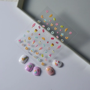 5D embossed nail stickers featuring pink ice cream cones and bakery sweets on display