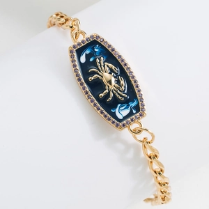 18K gold plated Cancer zodiac bracelet with blue enamel charm and purple rhinestones