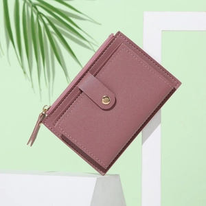 Slim dusty rose PU leather wallet with multiple card slots and secure metal zipper