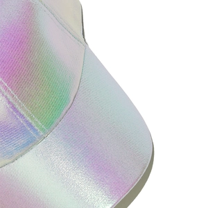 Detail of laser iridescent PU leather baseball cap showing texture and stitching