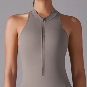 Detailed view of grey sleeveless athletic bodysuit with front zipper and high neckline