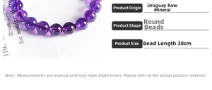 Macro detail of natural Uruguay purple amethyst round beads with 38cm strand length