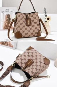 Detail view of printed bucket bag showing geometric pattern and leather shoulder strap