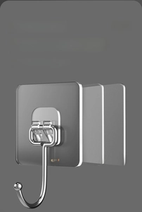 Exploded view showing the three-layer heavy duty adhesive structure of the silver metal hook