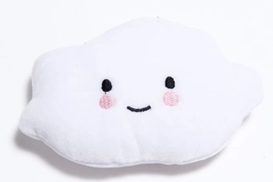 Close-up of soft white plush cloud toy with embroidered smiling face and pink cheeks