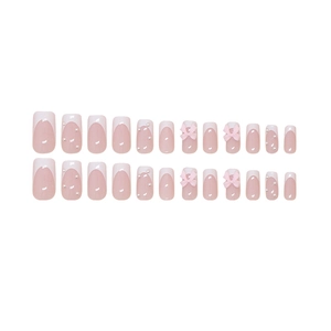 White French tip press-on nails with 3D pink bows and pearl accents, 24-piece set