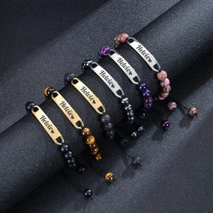 Customized stainless steel ID plate bracelet with pink zebra jasper and natural beads