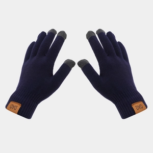 Detail of navy knit touch screen gloves with three-finger conductive tips and DAD leather patch