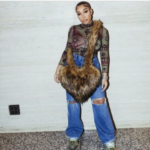 Faux raccoon fur heart-shaped oversized crossbody bag featuring tan gradient plush texture