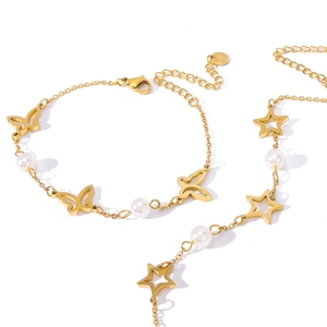Elegant gold stainless steel bracelet set with butterfly, star charms and white pearls