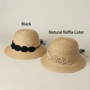 Elegant raffia straw sun hat with crochet flower band for women beach wear