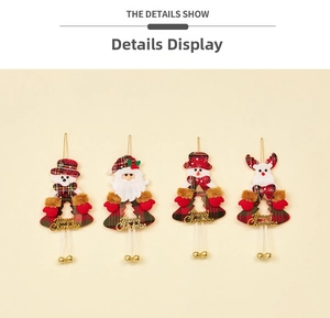 Detail of Christmas plush ornaments with plaid fabric, small gold bells and embroidery