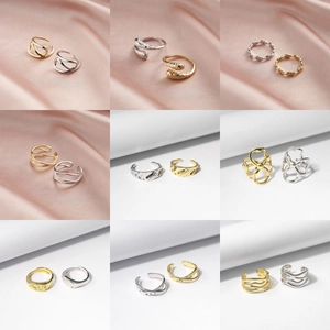 Collection of minimalist 925 sterling silver rings in gold and silver finishes