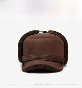 Detailed front view of dark brown winter hat with thick faux fleece lining and sports tag
