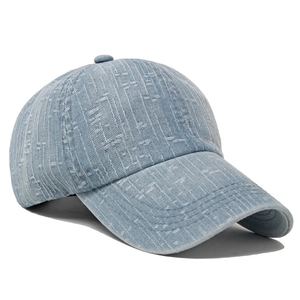 Retro washed denim baseball cap in light blue with distressed details and curved brim