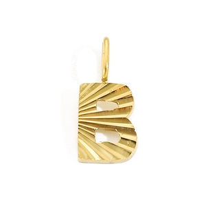 Detailed close-up of golden letter B pendant with sunburst texture in stainless steel