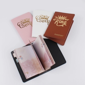 Faux leather travel passport covers for couples featuring gold stamped romantic lettering