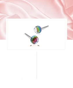 Macro shot of Aurora Crystal Ball Stud Earrings made of S925 pure silver on silk