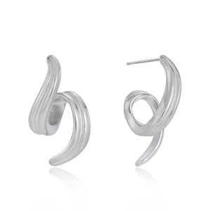 Close-up of silver spiral earrings in polished stainless steel with unique wave design