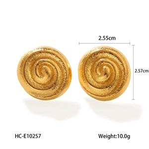 Detailed view of 18k gold plated conch earrings with hammer texture and size dimensions