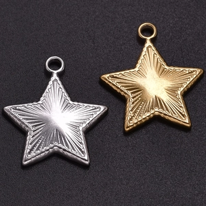 Detailed view of 304 stainless steel star pendants in gold and silver finish