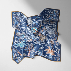Detailed close-up of navy silk square scarf with hand-drawn tropical palm tree prints