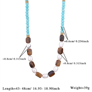 Detailed view of bohemian beaded necklace with pearls and natural turquoise stones and size specs