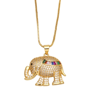 Detailed close-up of golden elephant pendant with micro-set stones and rainbow gems