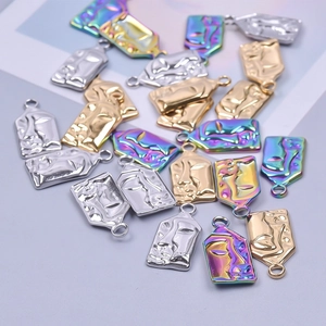 Abstract face relief pendants in 18k gold, silver, and rainbow finishes for DIY jewelry