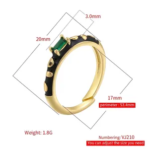Adjustable leopard print black enamel ring with rectangular green gemstone inlay
