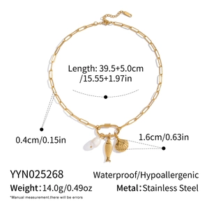 Detailed view of gold stainless steel necklace with seashell and pearl charms measurements