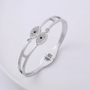 Bracciale a doppia fila in acciaio inossidabile argento con design malocchio e strass