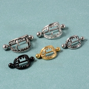 Vampire teeth nipple rings in gold, silver, black, and antique silver finishes