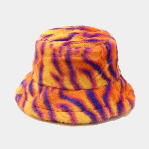 Detailed texture of thick plush faux fur bucket hat with purple and orange zebra patterns