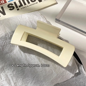 Minimalist cream shark hair claw clip 10cm size detail showing steady resin structure