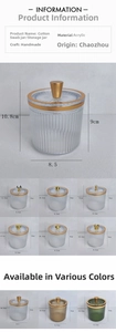Detail view of acrylic storage jars with dimensions and golden lid decorations