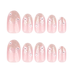 Pink glitter gradient press-on nails with floral patterns and rhinestones on white background