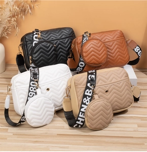 Quilted V-pattern crossbody bags in four colors with matching round coin purses