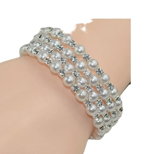 Elegant four-layer pearl bracelet with sparkling rhinestones for women on wrist