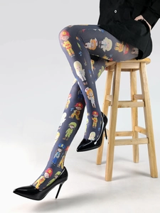 Detail of grey tights featuring cartoon character prints like nurses and doctors