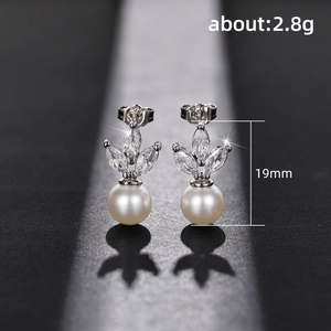 Elegant silver horse-eye zircon stud earrings with a dangling white pearl drop for women