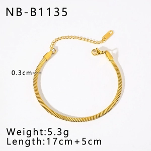 Detail of gold snake chain bracelet featuring lobster clasp and adjustable extension link