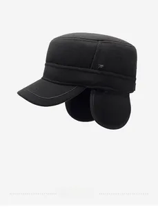 Detail shot of black wool winter flat cap with earflaps and silver metal decorative buckle