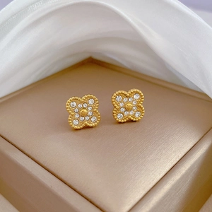Gold plated four-leaf clover stud earrings with pavé crystals and beaded edge finish