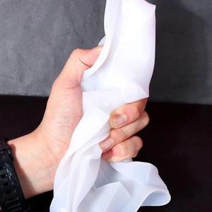 Close-up showing the high flexibility and resilience of white silicone soap mold material